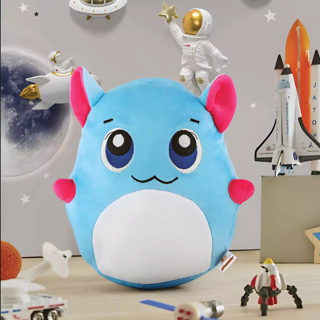 aurbo blue plush pillow soft toy on a table with props in the background